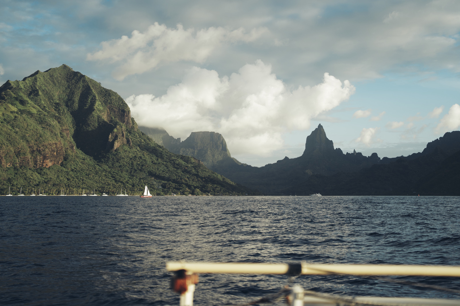 Sailboats and volcanic mountains in French Polynesia